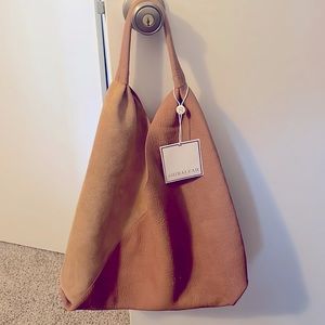 This purse is a Shiraleah purse, the Arden tote in tan.